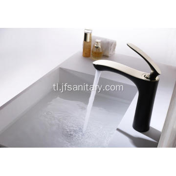 Fashion black and gold single hole basin gripo.